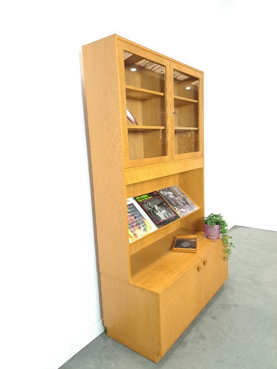 Image 1 of Tall LP display case with glass doors and reading shelf from Sweden