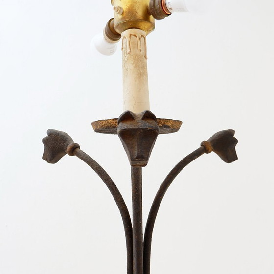Image 1 of Wrought-iron tripod floor lamp adorned with stylized animal heads