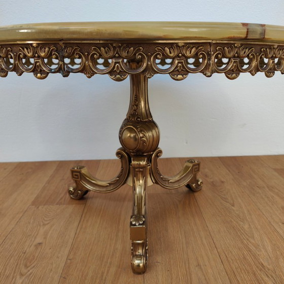 Image 1 of Vintage round Regency coffee table with marble top and brass base