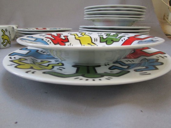 Image 1 of Keith Haring Dinnerware: 3 different sized plates, 1 coffee cup and saucer.