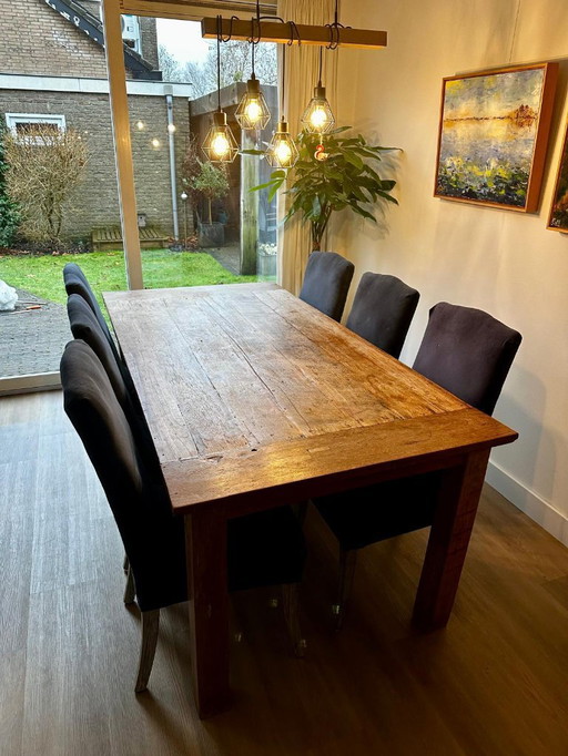 Robust wooden dining table