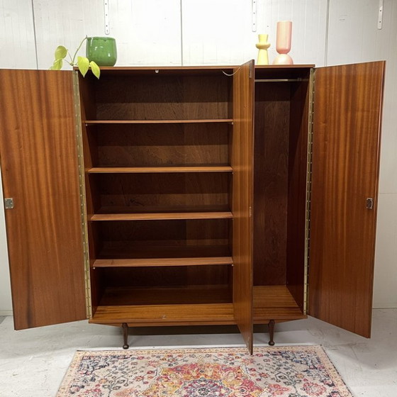 Sleek Danish vintage 3-door wardrobe with hanging and shelving – Wood (photo 11 of 12)