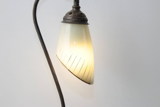 Image 1 of Vintage brass table lamp with curved arm and glass shade