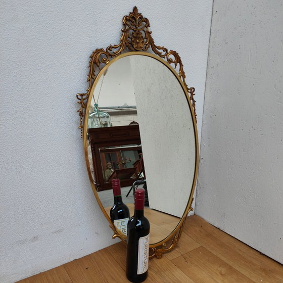 Image 1 of Vintage Goudkleurige Ovale spiegel kuifspiegel schouwspiegel. Koper 