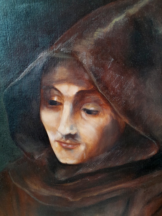 Image 1 of Retrato al óleo de un monje con un vestido rústico sobre un fondo marrón