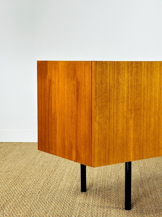 Image 1 of Minimalist Scandinavian sideboard in teak with black metal legs, 1960