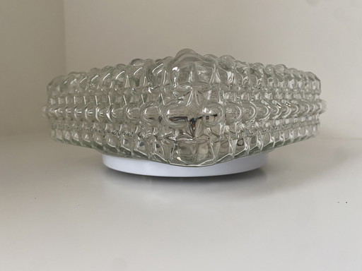 Vintage ceiling lamp made of thick glass with a spherical structure