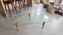 table basse vintage en verre en forme de rein