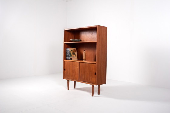 Image 1 of Deense teakhouten boekenkast uit het midden van de 20e eeuw met schuifdeuren – Sejling Skabe, jaren 60