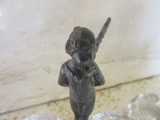 Image 1 of 2 recipientes para salero y pimentero con forma de ángeles querubines de cristal y metal negro (a uno de ellos le falta un ala) 