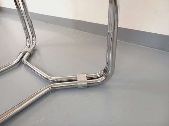 Image 1 of Round vintage dining table in smoked glass and chromed metal in the Space Age style of the 70s