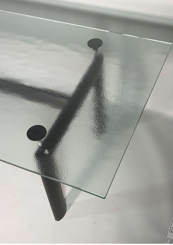 Image 1 of Modern and contemporary dining table, model LC6, glass top and black metal legs, Le Corbusier