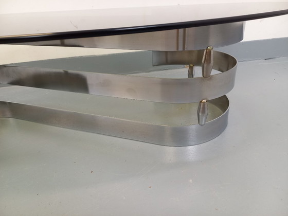 Image 1 of Vintage ovale salontafel van rookglas en verchroomd metaal uit de jaren 70.