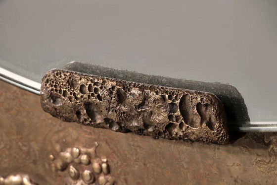 Image 1 of Specchio scultoreo in rame martellato attribuito ad Angelo Bragalini".