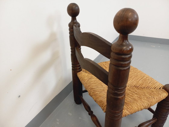 Image 1 of Vintage Charles Dudouyt Brutalist lage stoel in hout en stro uit de jaren 40