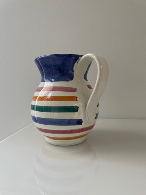 Image 1 of Handgemaakte vintage schenkkan met kleurrijke strepen
