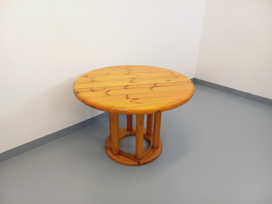 Image 1 of Vintage Scandinavian round dining table by Rainer Daumiller in pine from the 1960s/70s with extensions