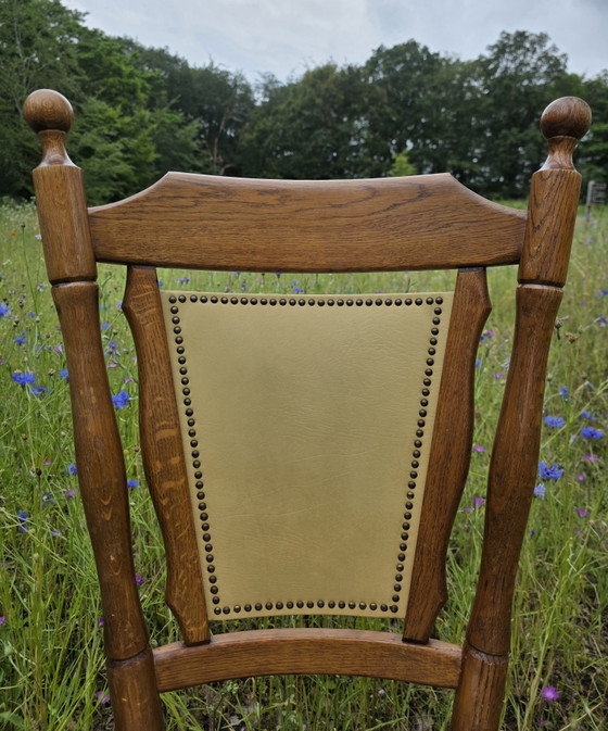 Image 1 of Set of 2 solid oak chairs with decorative nails