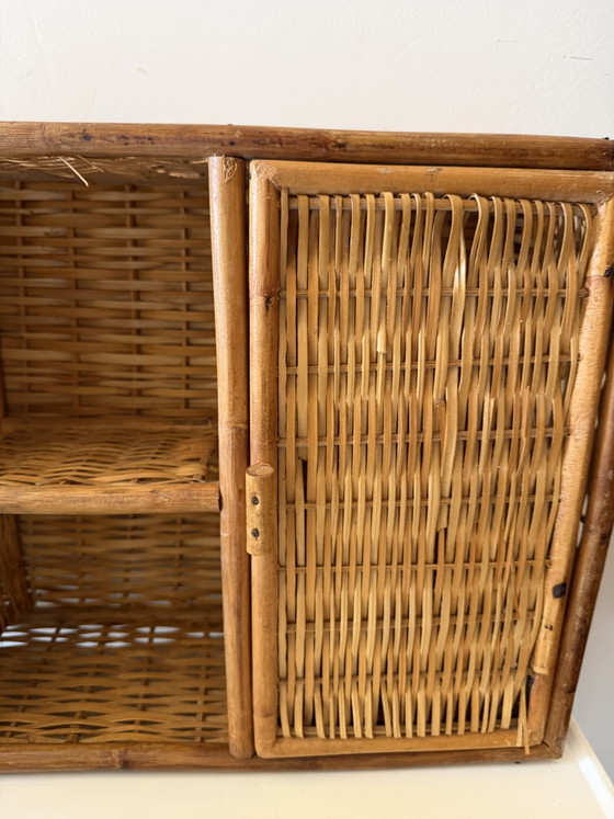 Image 1 of Rotan kastje met deurtjes