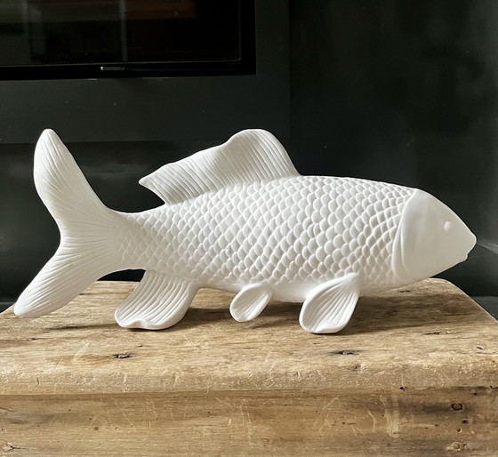 Image 1 of &K Amsterdam rinoceronte e pesce (koi)