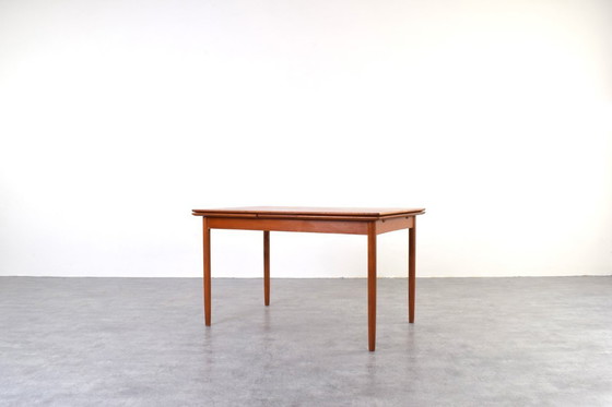 Image 1 of Table de salle à manger extensible en teck danois, style milieu du XXe siècle, années 1960.