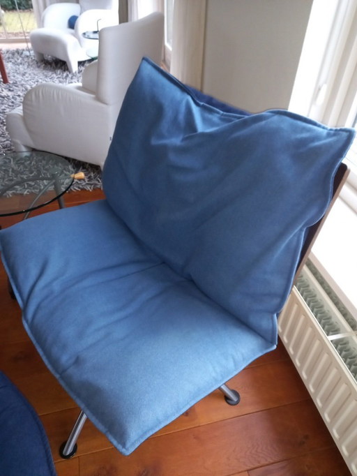 Lounge chair with footstool by Tom Stepp