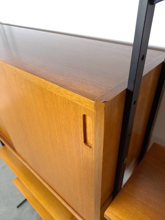 Image 1 of Parete componibile Omnia, Hilker, teak e acciaio nero con ripiani e mobiletto