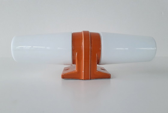 Image 1 of Porseleinen vintage wandlamp van Ifö Electric met 2 lichtpunten, oranje jaren 60 lamp ontworpen door Sigvard Bernadotte