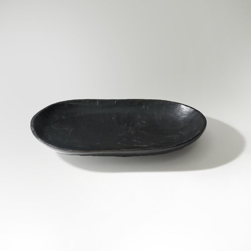 Ciotola in legno nero dalla forma organica, anni '60