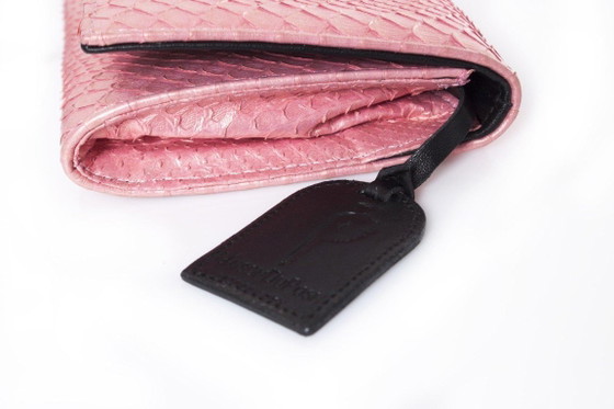 Image 1 of Maison du Posh, Pochette con teschio perforato in pitone rosa