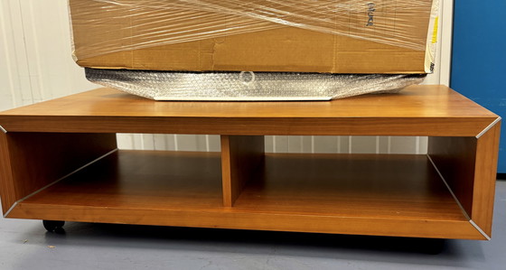 Image 1 of Coffee table/TV unit by Lignet roset: solid wood on casters: 108x61.5x31 cm