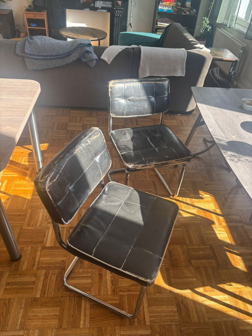 table wood and 4 chairs leather