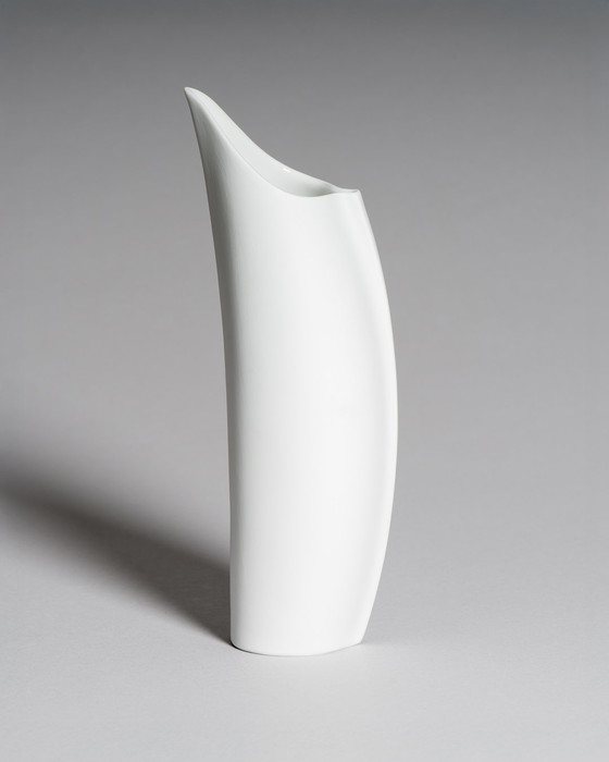 Image 1 of Curated Porcelain Duo: Lino Sabattini "Penguin" Vase (22cm) & Uta Feyl Sculptural Mini Vase – Rosenthal Studio Line, 1980s