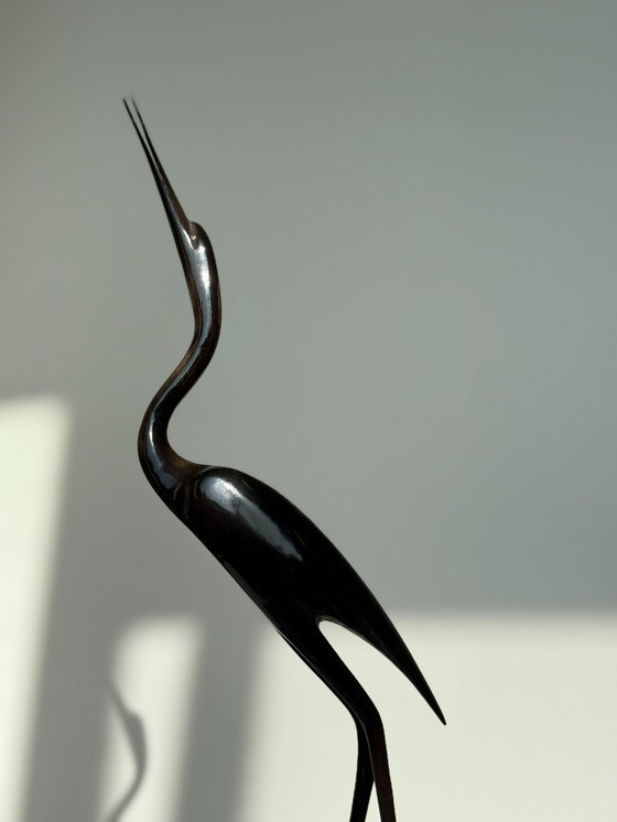 Image 1 of Héron vintage sculpté à la main