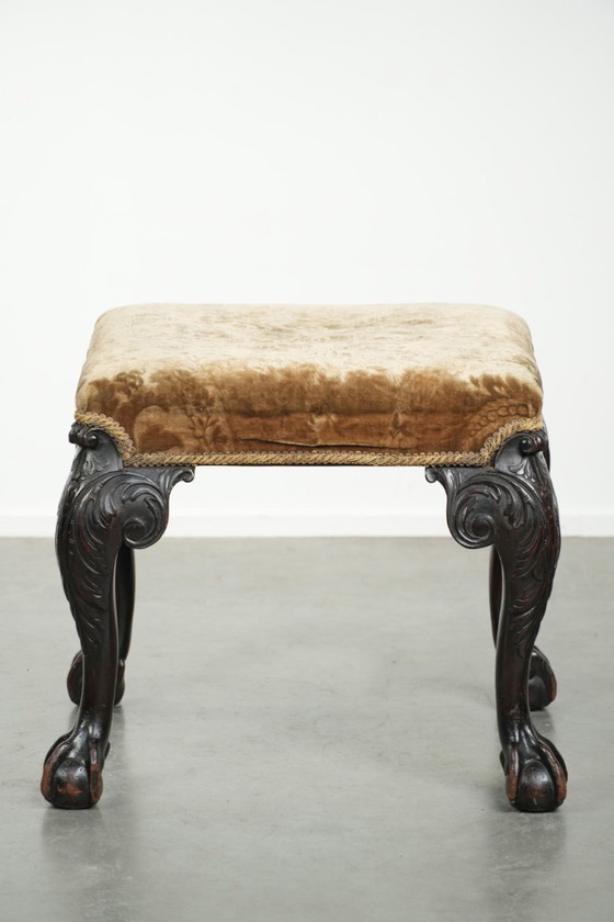 Image 1 of Antiek Hollands zitje/ hocker uit de 18e eeuw met velours stof, mooi houtsnijwerk en klauwpoten