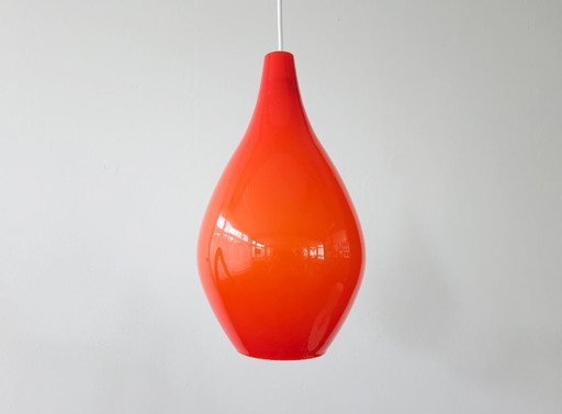 Drop-shaped mcm orange glass pendant lamp, white opal glass with orange top coat, scandinavian design