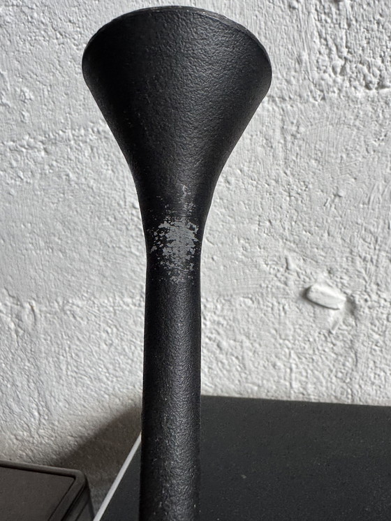 Image 1 of Black Memphis-style candlesticks from the 1980s