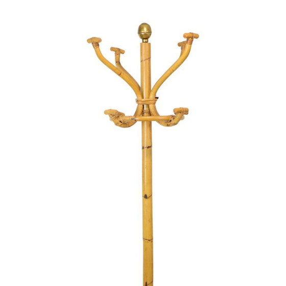 Image 1 of Raro perchero de pie de ratán latón