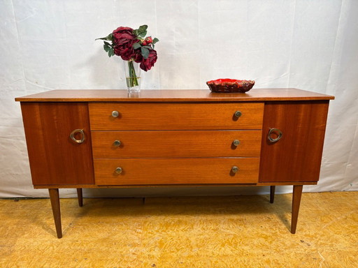 Mid Century Retro Teak Small Sideboard by Schreiber (Circa 1960)  A stylish and compact mid century modern teak sideboard by Sch