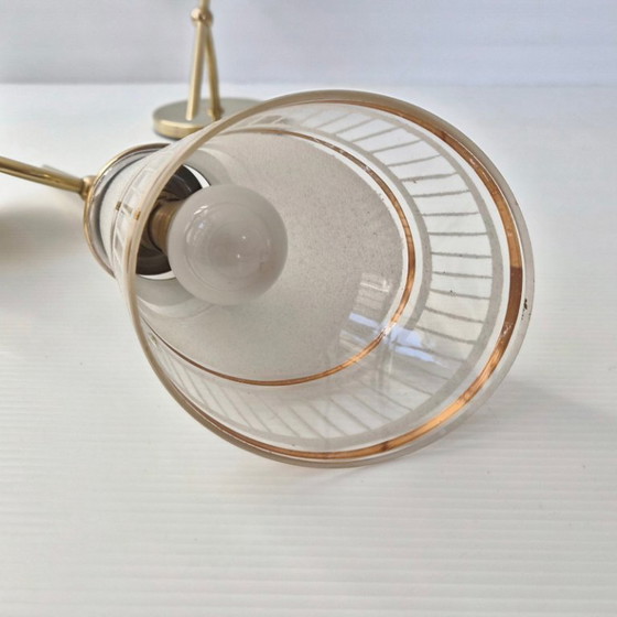 Image 1 of Een paar vintage wandlampen uit de jaren 50, gemaakt van glas en verguld messing.