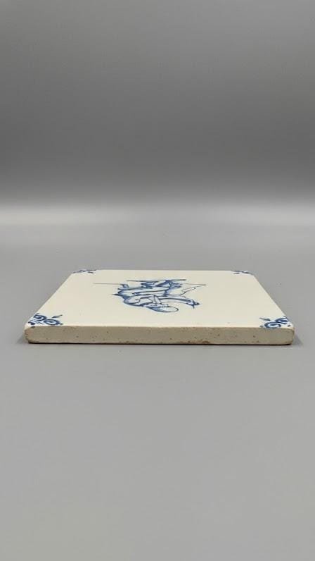 Image 1 of Antique Dutch Delft Tile with Seamstress Motif
