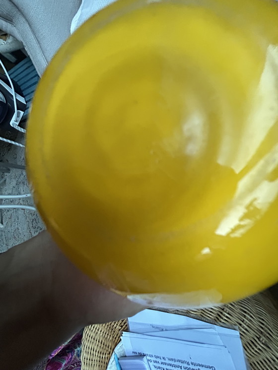 Image 1 of Yellow keyhole vase manufactured by Royal Leerdam