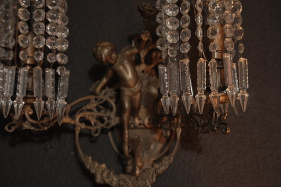 Image 1 of Bronze-colored Angel wall lamp