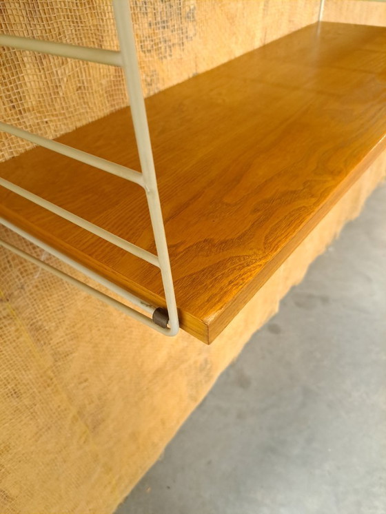 Image 1 of Sistema di parete modulare String con armadio e ripiani