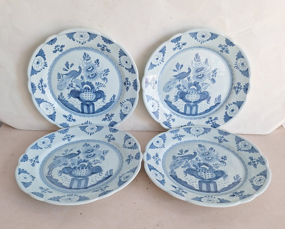 Image 1 of Firma Oud Delft Nijmegen 4 antike, zinnglasierte, handbemalte Pfauenteller aus Delfter Blau.