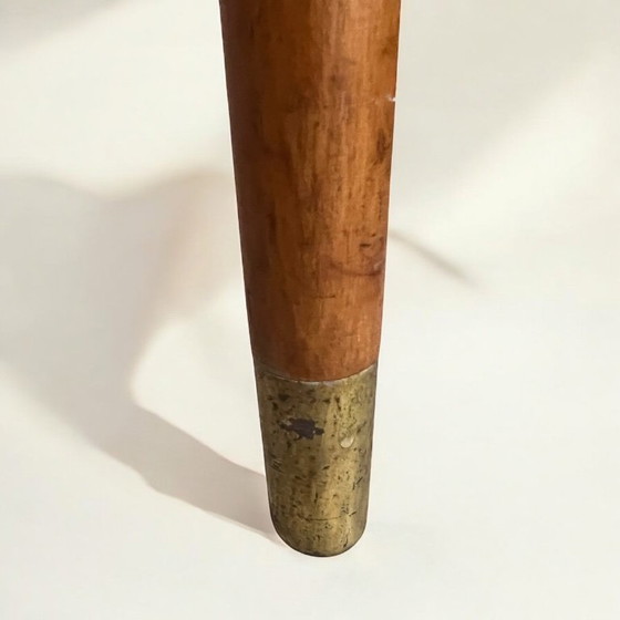 Image 1 of Niervormige bijzettafel met zwart glazen blad, gemaakt in Duitsland in de jaren 1960