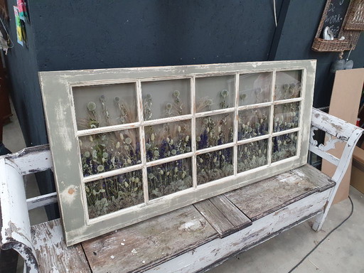 Cadre avec fleurs séchées