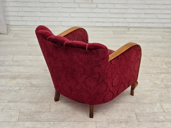 Image 1 of Anni '60, poltrona danese in velluto rosso ciliegia.