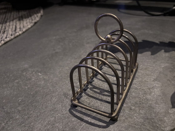 Image 1 of Vintage flessenonderzetters met houder – set van 6 – zilverkleurig