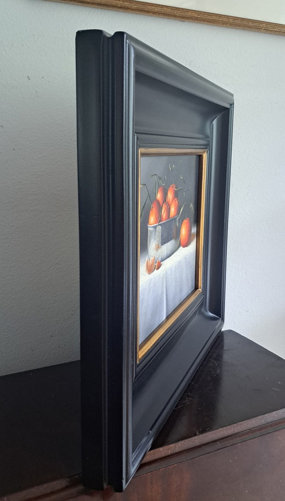 Image 1 of stilleven met sinaasappelen in zilveren schaal